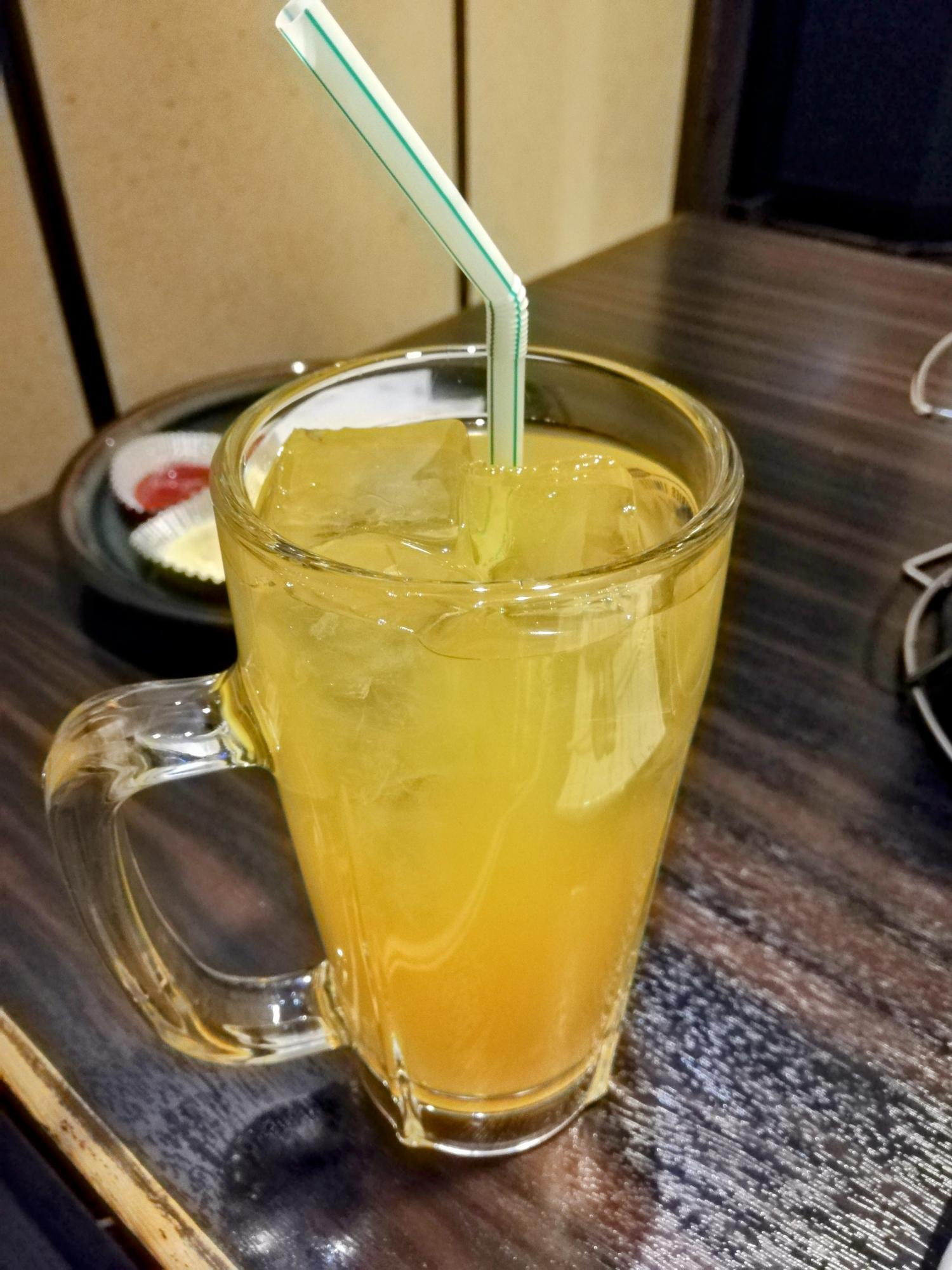 〆のオレンジジュース
